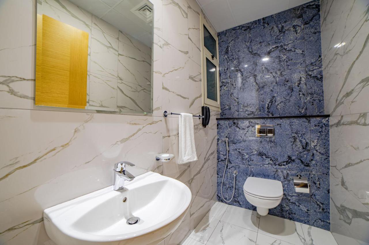 פוג'יירה Platinum Coast Hotel Apartments מראה חיצוני תמונה Bathroom