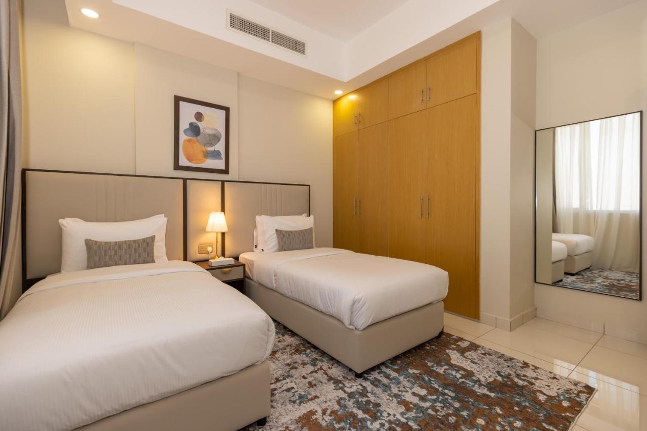 פוג'יירה Platinum Coast Hotel Apartments מראה חיצוני תמונה A bedroom at the hotel